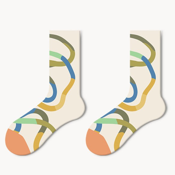 Unisex ChicToes beige crew socks with colorful abstract line pattern and orange toes