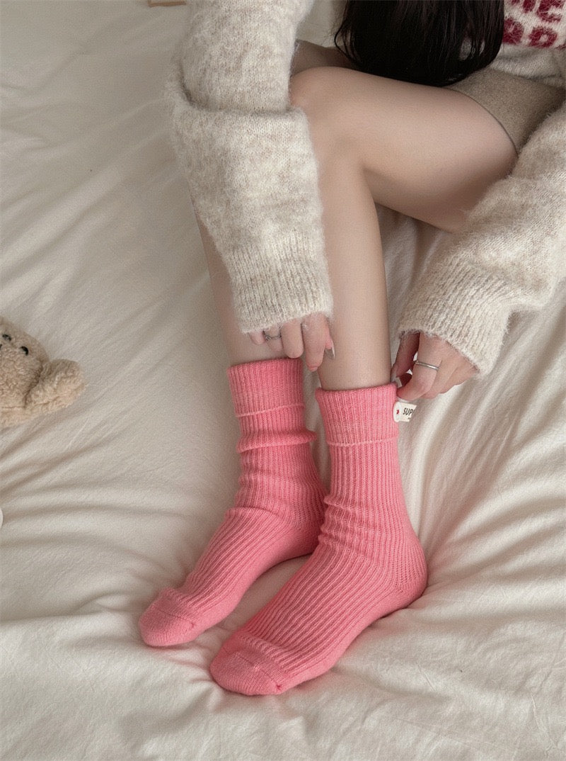 Model wearing ChicToes pink button socks