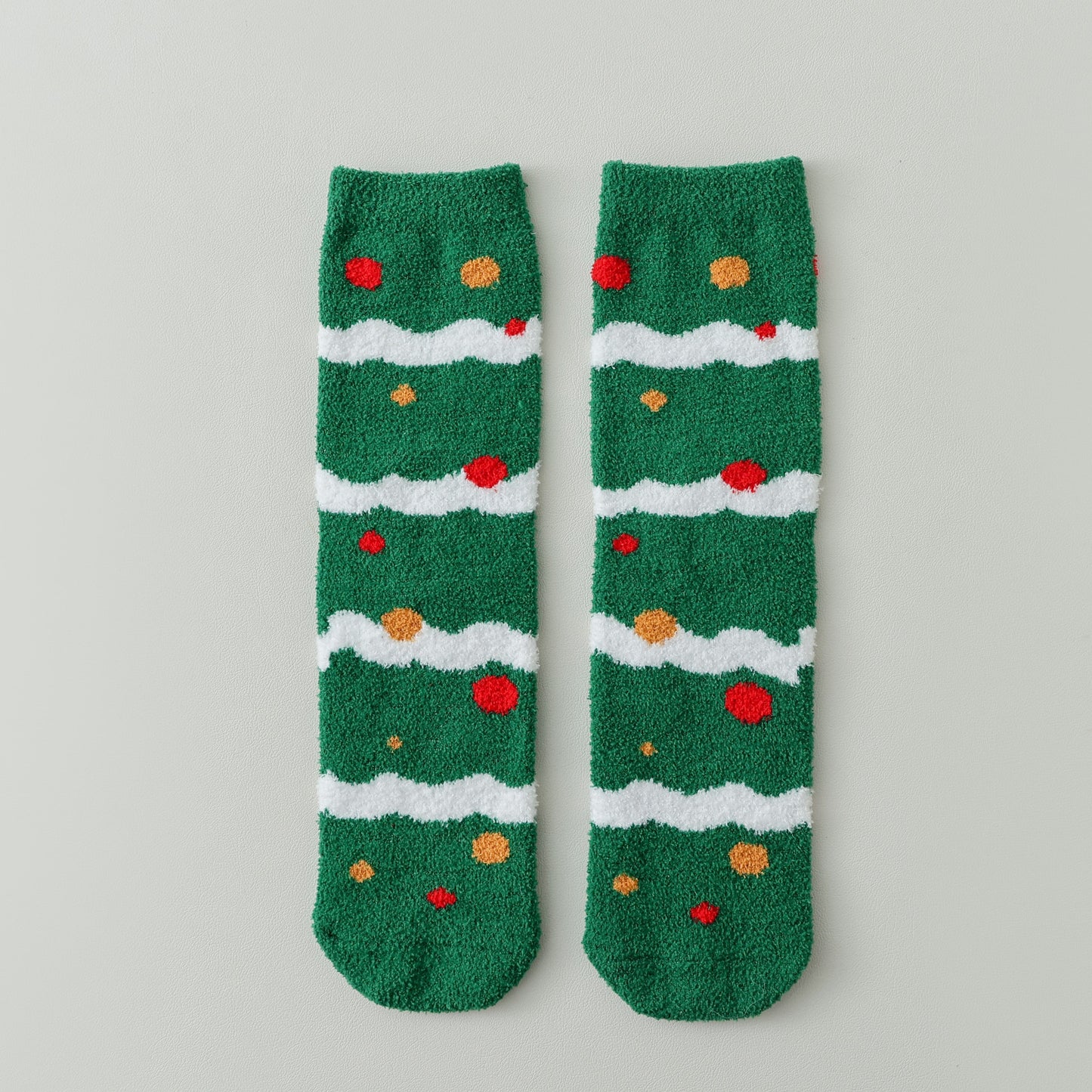 ChicToes fuzzy and cozy sleep socks in green and Christmas tree pattern