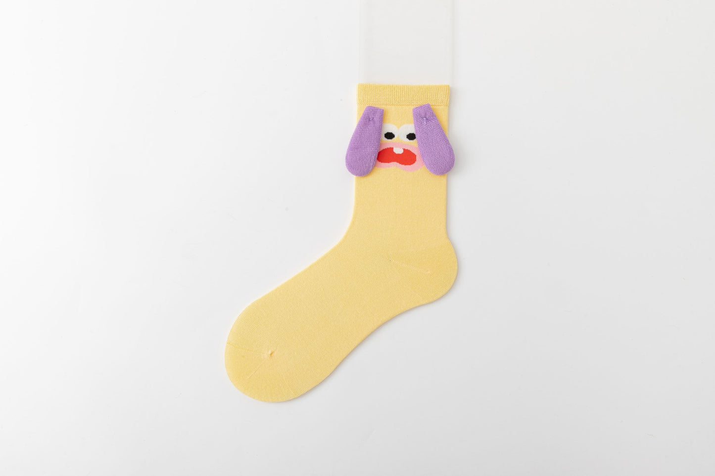 Custard yellow cotton socks, with playful cartoon faces and 3D god ears