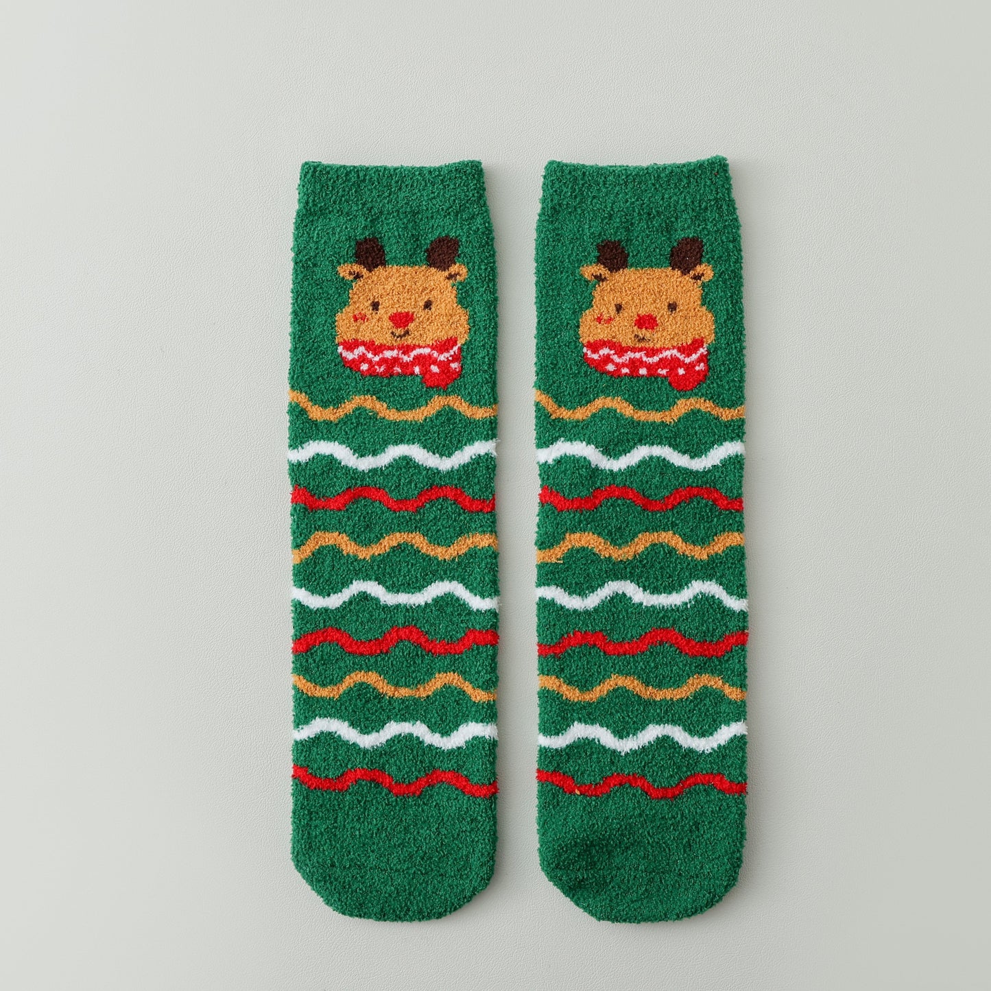 ChicToes fuzzy and cozy sleep socks in green and christmas reindeer pattern